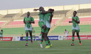 Janet Bundi and Lydia Akoth celebrating Lydia Akoths goal scaled