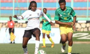 Uganda's Hadijja Nandago (L) in action. She scored the lone goal as her side beat