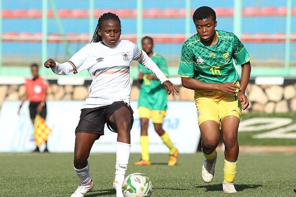 Uganda's Hadijja Nandago (L) in action. She scored the lone goal as her side beat