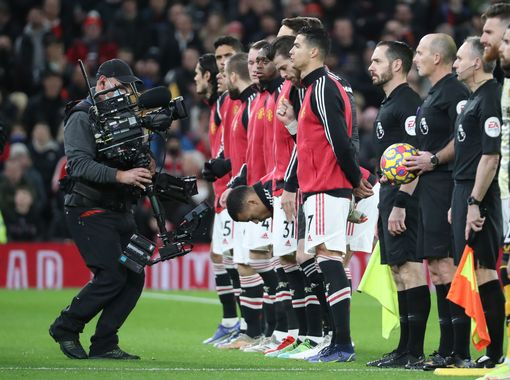 Manchester United players lining-up during a past match.