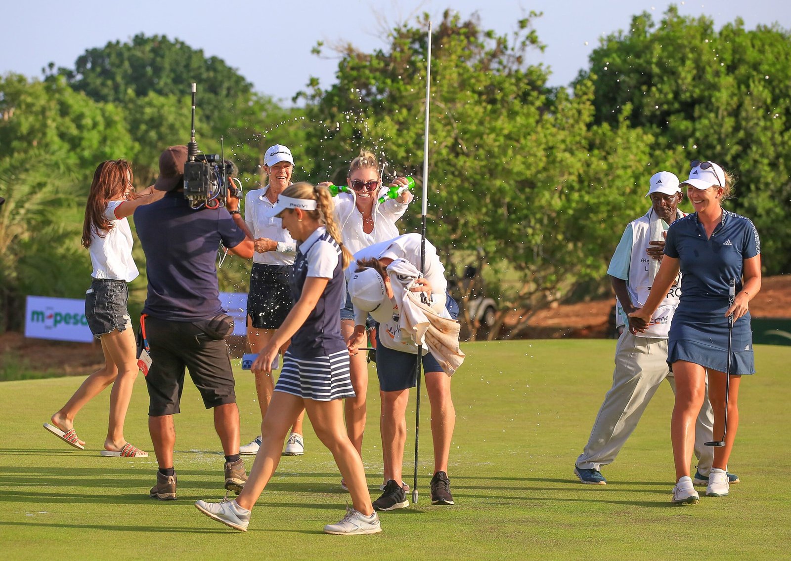 LET Players celebrate with Esther Henseleit after she won the 2022 Magical Kenya Ladies Open at the PGA Baobab COurse Vipingo Ridge Kilifi County on Sunday February 13 2022 min scaled