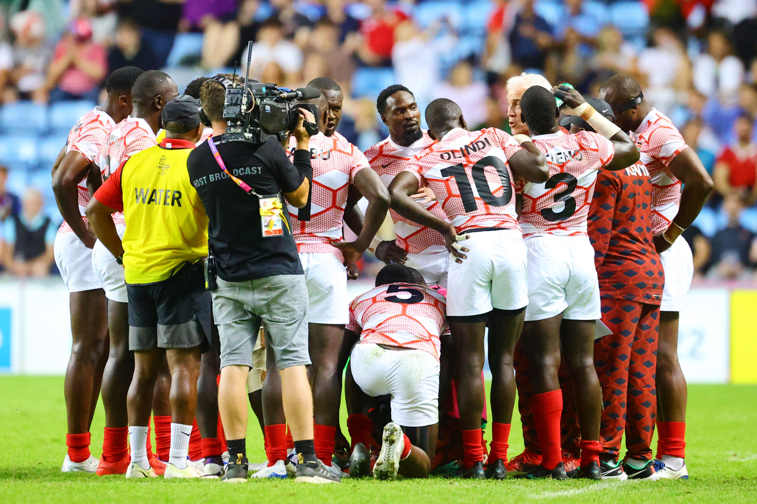 Shujaa hurdle together during a match at the Commonwealth Games