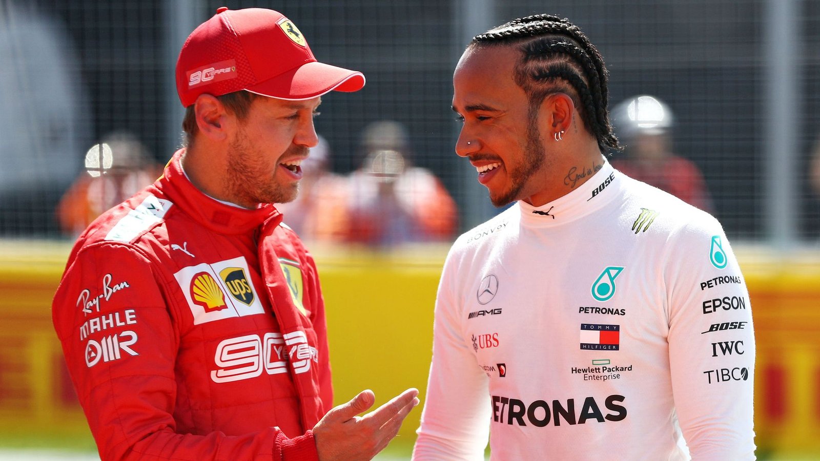 Sebastian Vettel with Lewis Hamilton