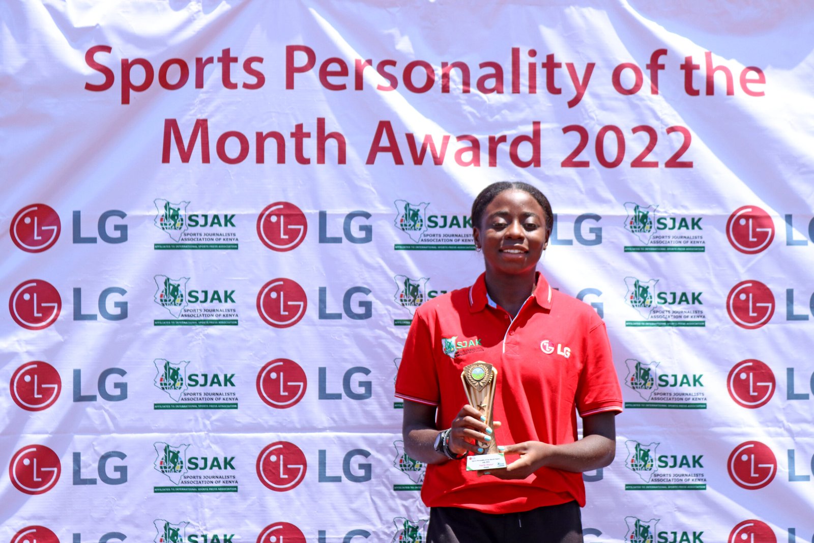 Angela Okutoyi poses with the July Award at Nairobi Club scaled