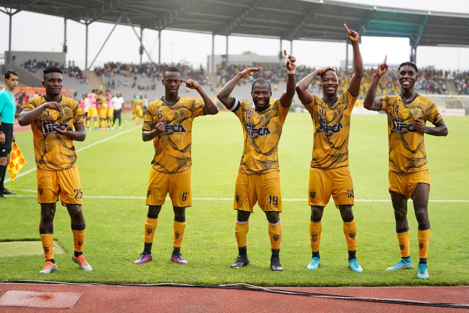 Asec Mimosas celebrate their win