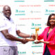 Strathmore coach Meshack Senge receives his award from StarTimes Kenya Marketing Manager Tamima Ibrahim