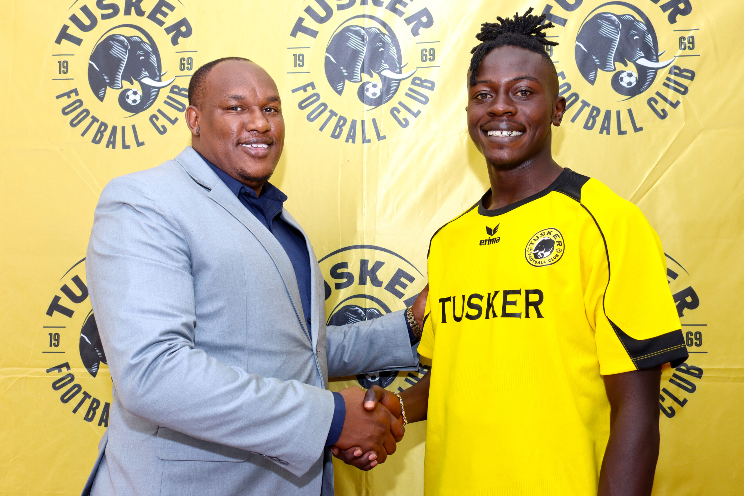 Levin Odhiambo with Tusker CEO Sam Nzau