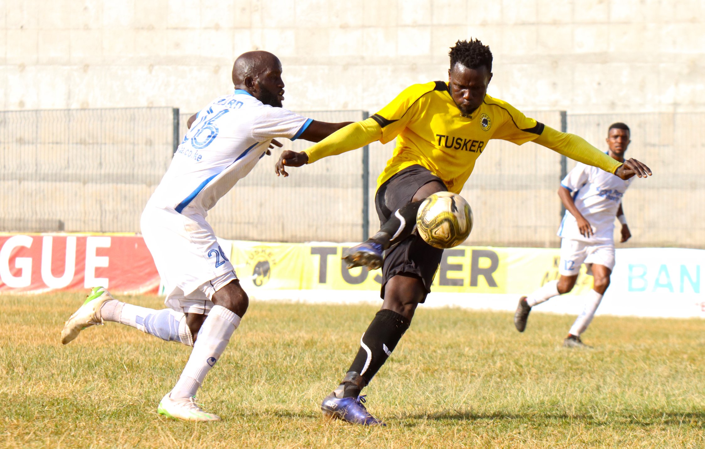 Tusker's Deogratious Ojok tries a shot from inside the box