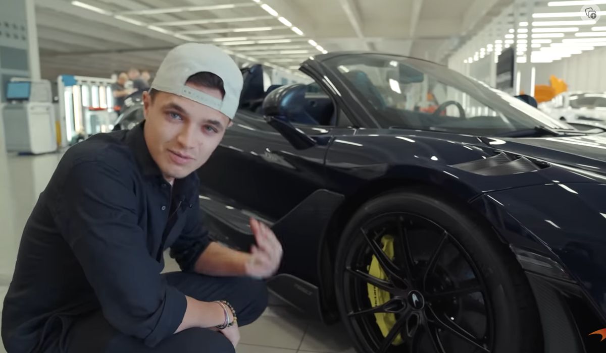 Lando Norris poses alongside his new McLaren 765L