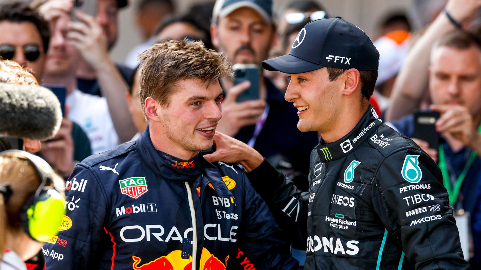 George Russell with Max Verstappen