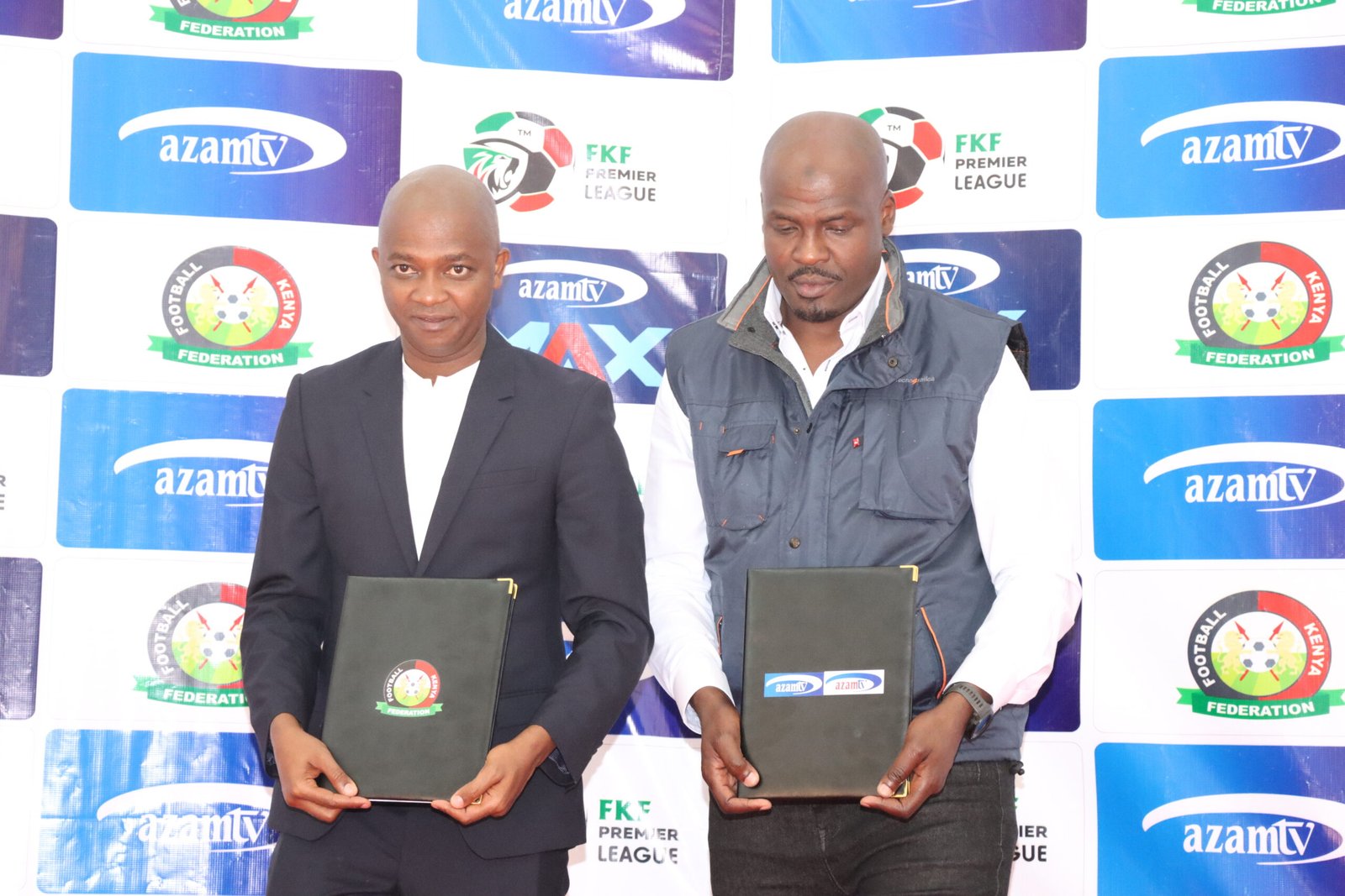 FKF President Nick Mwendwa and Azam TV COO Yahya Mohamed during the unveiling of the partnership.