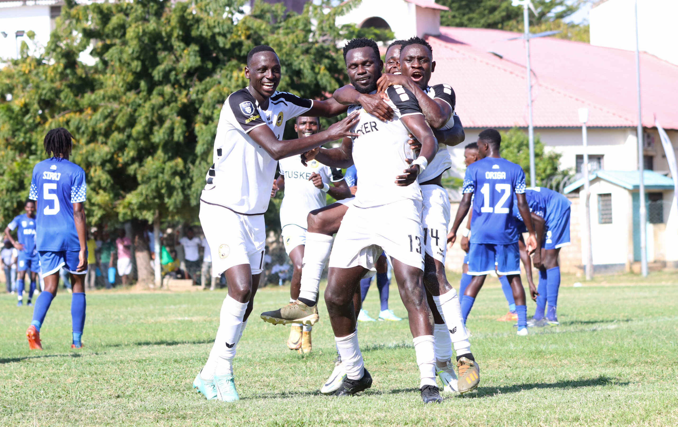 Tusker FC players celebrate Deogratious Ojok's goal