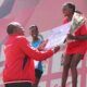 Agnes Barsosio with a dummy cheque after winning the Nairobi City Marathon. PHOTO/Courtesy