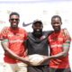 Head coach Kevin Wambua (centre) with captains Vincent Onyala (left) and Tony Omondi (right)