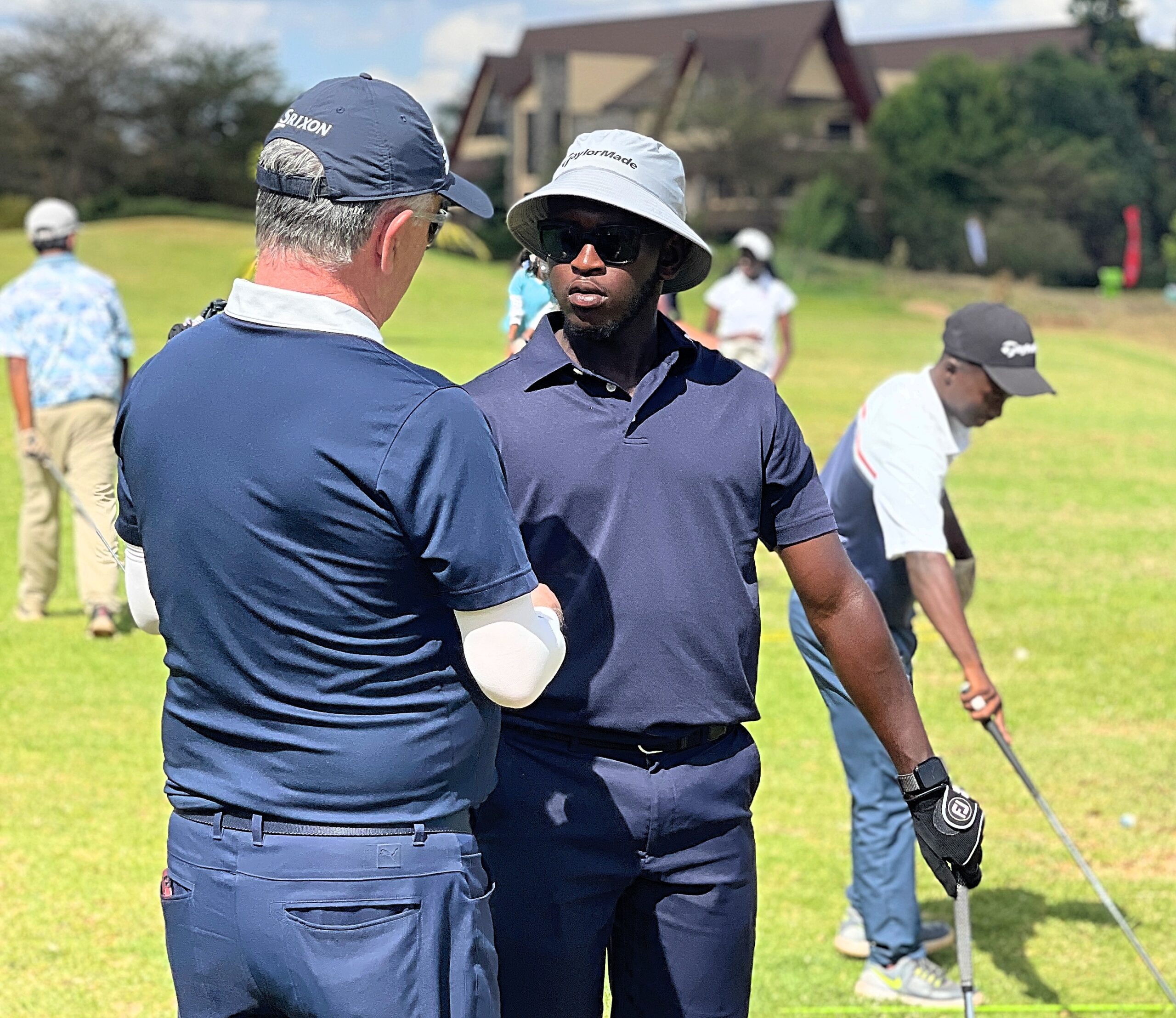 Daniel Kiragu and Coach Paul McKenzie