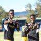 Tusker FC players Fabien Adikiny and James Kibande celebrate after the win against Sofapaka