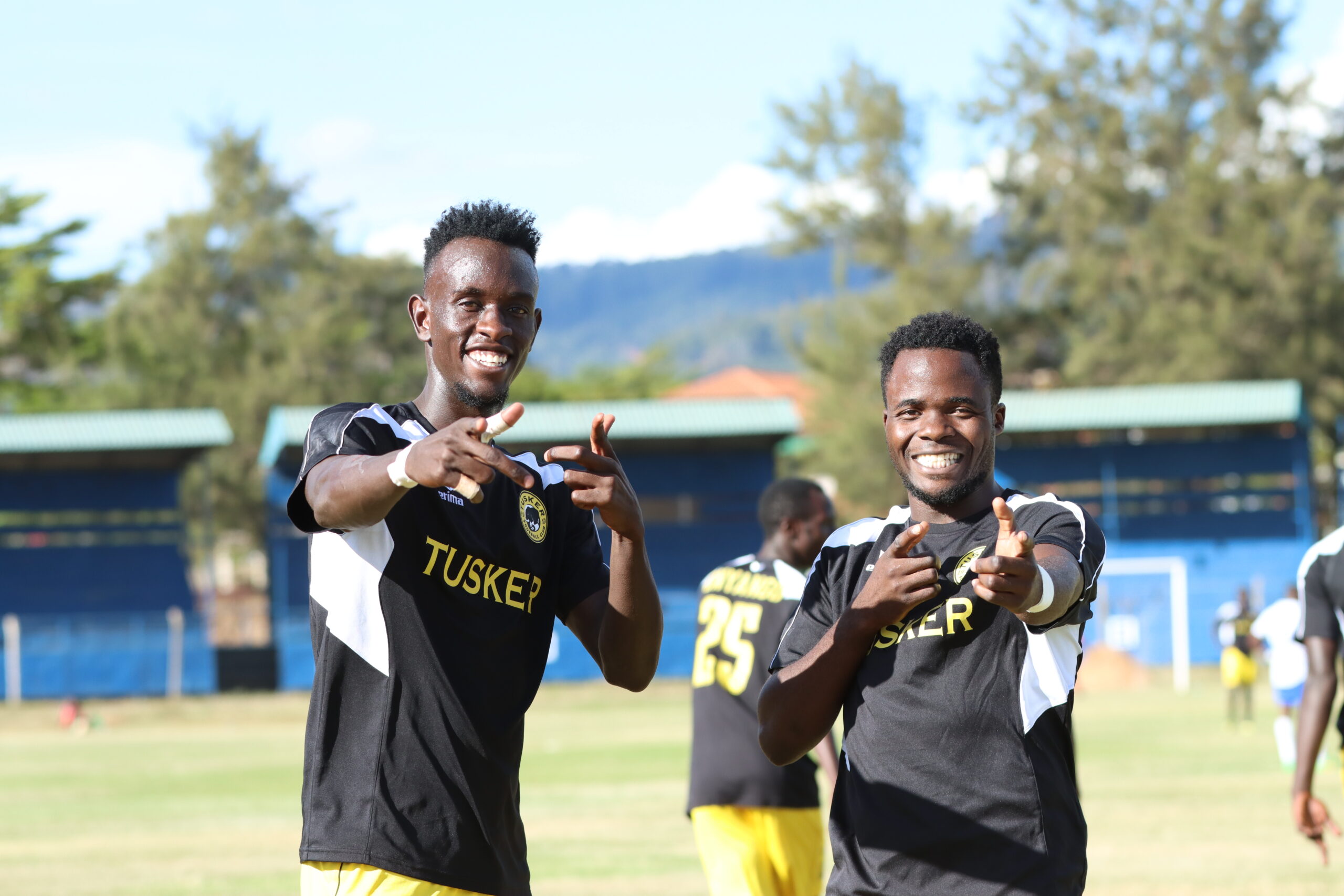 Tusker FC players Fabien Adikiny and James Kibande celebrate after the win against Sofapaka