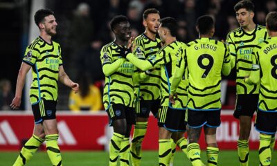 Arsenal players celebrate Sakas goal Photo Erosport