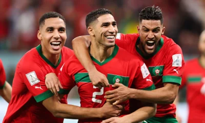 Morocco players celebrating winning a match at the World Cup in Qatar Photo Goal