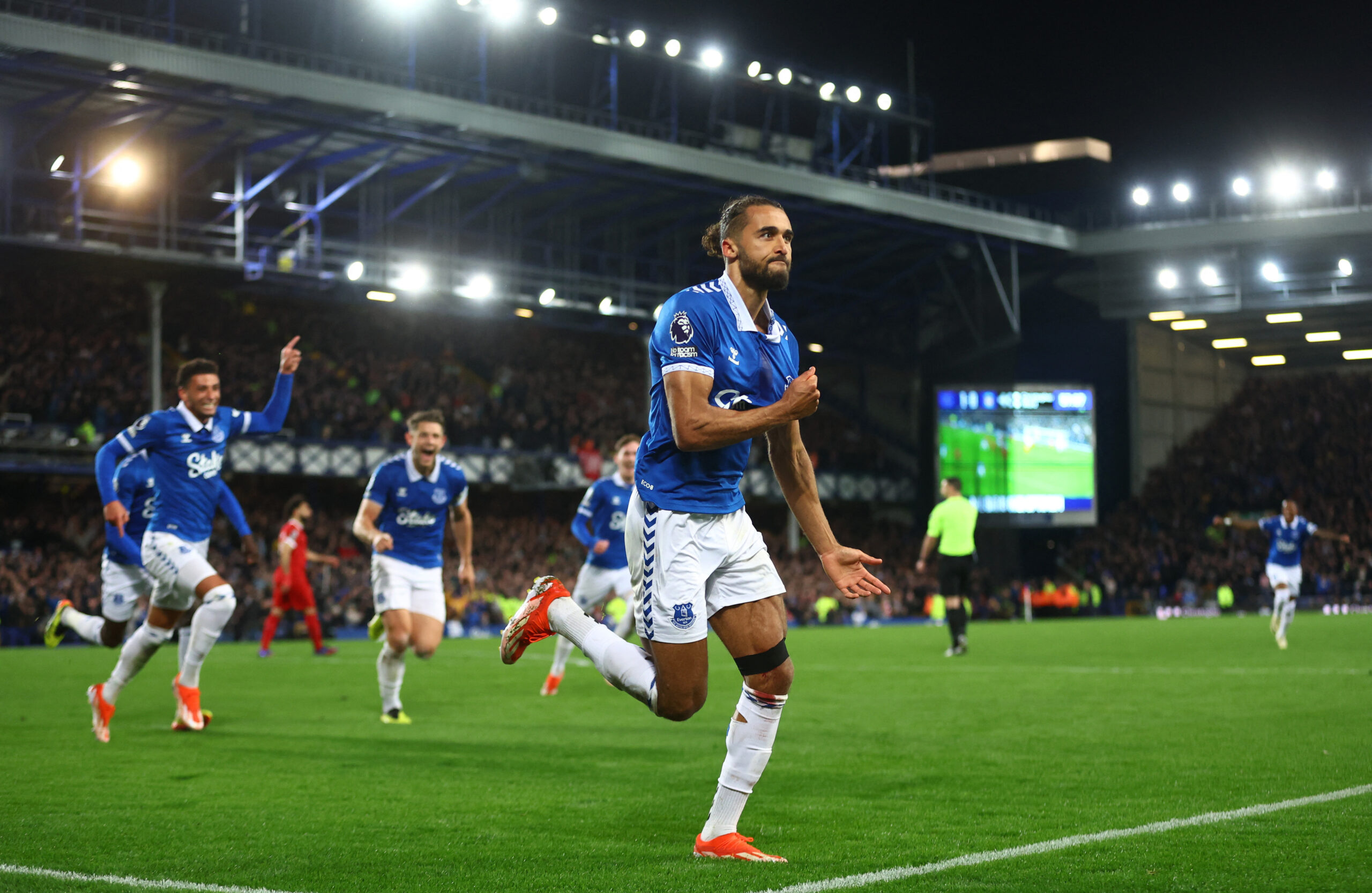 Calvert Lewin celebrates scoring against Liverpool.