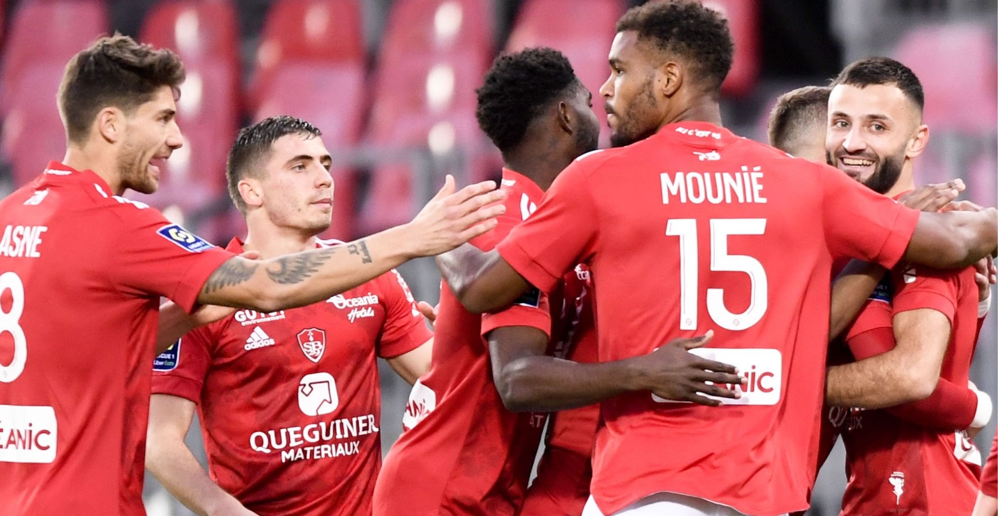 Brest players celebrating a goal.