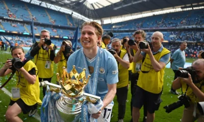 Kevin de Bruyne lifting the Premier League trophy Photo Football London